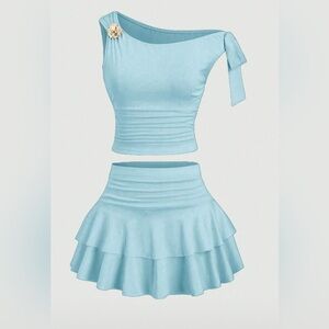 Elegant Light Blue One-Shoulder Top and Skirt